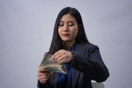 Photo for Portrait of a young Asian business woman in various poses, studio shot, business concept, isolated background - Royalty Free Image