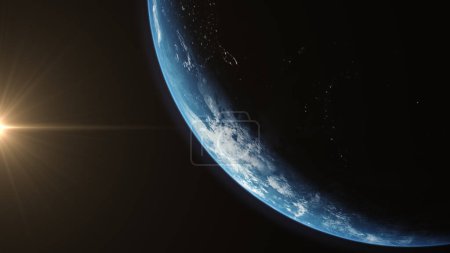 Foto de Una representación cinematográfica del planeta Tierra durante el amanecer como vista desde el espacio con vibrante atmósfera azul y cielo nublado mostrando continentes debajo - Imagen libre de derechos