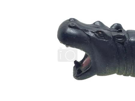Photo for The hippo's head is on a white background. Photo the face of a toy hippo on a white background - Royalty Free Image