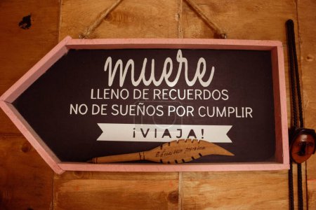 Photo of decorative motivational wall hung signs in a cabin in Mexico. 