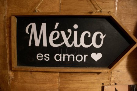 Photo de mur de motivation décoratif accroché signe dans une cabine au Mexique. 