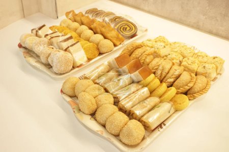 Jajanan pasar, various Indonesia traditional market snack, such as pastel, risol, donat, onde-onde and martabak mini.