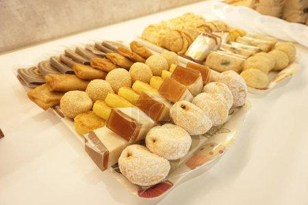 Jajanan pasar, various Indonesia traditional market snack, such as pastel, risol, donat, onde-onde and martabak mini.