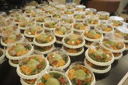 Small cone green shaped rice or Nasi tumpeng hijau mini in Indonesian culture is a food for festive or celebration of any moments.