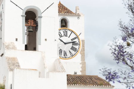 clock tower of santa maria church in tavira portugal