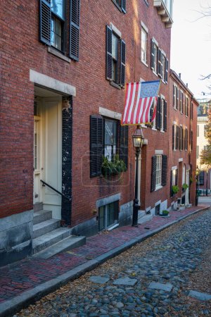 Photo for Acorn Street Beacon Hill house during fall harvest with American Flag and cobblestone alley in Boston, Massachusetts - Royalty Free Image