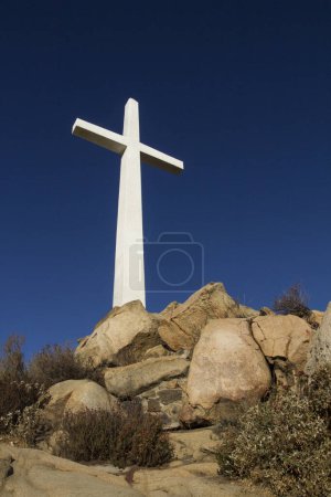 Photo for White cross on stone Calvary hill - Royalty Free Image