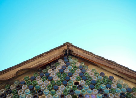 Photo for Old glass bottle house with gable roof line - Royalty Free Image