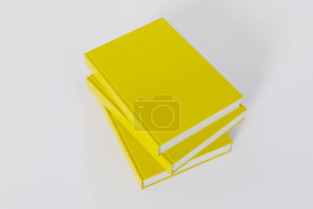 Foto de Pila de libros amarillos cerrados aislados sobre fondo blanco con espacio de copia - Imagen libre de derechos