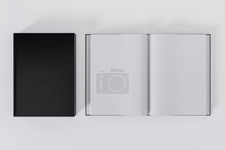 Téléchargez les photos : Livres noirs ouverts et fermés isolés sur fond blanc avec espace de copie - en image libre de droit