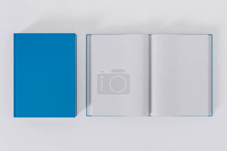 Téléchargez les photos : Livres bleus ouverts et fermés isolés sur fond blanc avec espace de copie - en image libre de droit