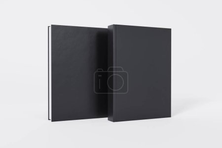 Téléchargez les photos : Livres noirs fermés debout isolés sur fond blanc avec espace de copie - en image libre de droit