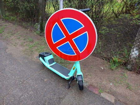 electric scooter QR code validating road sign no stopping violate rules law cross penalty