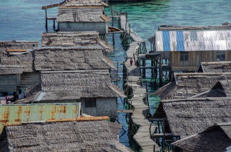 Photo for Bajo village in Malenge, Togian Islands, Sulawesi, Indonesia. Sea gipsy. A village built on stilts on the sea. - Royalty Free Image