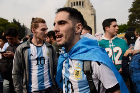 Photo for December 18, 2022, Mexico City, Mexico: Argentine fans attend the FIFA Fan Fest at the Monument to the Revolution to support their team in the FIFA World Cup final against the French team - Royalty Free Image