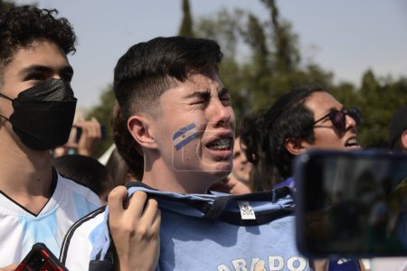 Foto de 18 de diciembre de 2022, Ciudad de México, México: Aficionados argentinos celebran a Argentina como nuevo Campeón Mundial de la Copa Mundial de la FIFA en el Fan Fest de la FIFA en el Monumento a la Revolución - Imagen libre de derechos