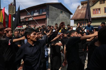 Photo for July 29,2023, Srinagar Kashmir, India : Kashmiri Shiite mourners participate in an Ashura procession on 10th of Muharram, the first month of Islamic Calendar, in Srinagar. The mourning of Muharram - Royalty Free Image