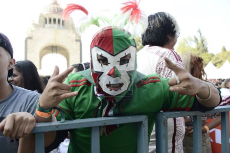 Photo for November 26, 2022, Mexico City, Mexico: Mexicans Fans attend the FIFA Fan Fest at the Monument of the Revolution to support the Mexico's team on match against Argentina during the FIFA World Cup Qatar 2022 - Royalty Free Image