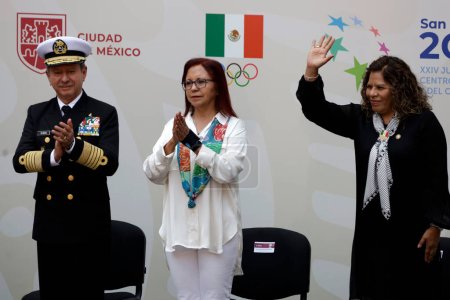 Photo for June 15, 2023, Mexico City, Mexico: The Secretary of Public Education, Leticia Ramirez; the president of the Mexican Olympic Committee, Maria Jose Alcala and the secretary of the Navy, Jose Rafael Ojeda Duran, at the flag-waving ceremony for the JCC - Royalty Free Image