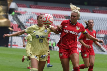 Photo for July 15, 2022, Mexico City, Mexico:  Irina Pando   of the  Bayer Leverkusen and Mayra Pelayo of America Football Club in action during a Friendly Women's football match between Club America and Bayer Leverkusen at Azteca stadium - Royalty Free Image