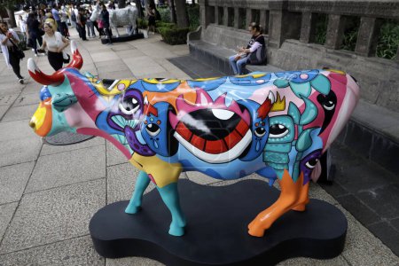 Photo for July 23, 2023, Mexico City, Mexico: More than 50 fiberglass cows intervened by plastic artists are exhibited on Reforma avenue as part of the 2023 Mexico City Cow Parade in Mexico City. on July 23, 2023 in Mexico City, Mexico - Royalty Free Image