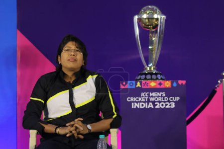 Photo for July 06, 2023, Kolkata,India: Former Indian women cricketer Jhulan Goswami speaks next to the world cup cricket trophy  during the ICC Mens Cricket World Cup Trophy Tour at a school - Royalty Free Image