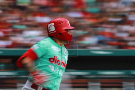 Photo for June 10, 2023 in Mexico City, Mexico:  Juan Carlos Gamboa #47 of Red Devils of Mexico running to the base during the mexican baseball league match  between the Yucatan Lions and the Mexico Red Devils at the Alfredo Harp Helu stadium - Royalty Free Image