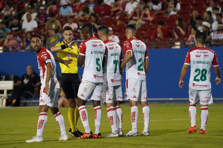 Photo for July 25, 2023, Fisco, United States: Necaxa captain Jose Esquivel checks with his goalkeeper to make sure the players are positioned correctly against the upcoming Dallas free kick during the Leagues Cup match between FC Dallas and Necaxa - Royalty Free Image