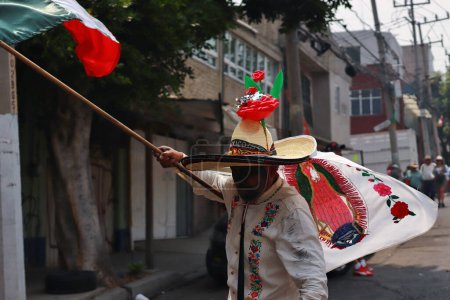 Photo for May 05, 2023 in Mexico City, Mexico: Inhabitants of the Peon de los Baos neighborhood, take part during the 93th parade to commemorate the Battle of Puebla on May 5, 1862, it has been declared Intangible Cultural Heritage - Royalty Free Image