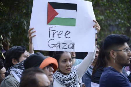 Photo for October 12, 2023, Mexico City, Mexico: A person holds a placard during  a rally outside the Israeli Embassy in Mexico to protest of the recent attacks by the Israeli army against the people of Palestine and demand stop of the war against Gaza - Royalty Free Image