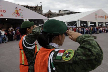 Photo for October 15, 2023, Mexico City, Mexico: Members of the Mexican Army lower the monumental flag of Mexico in the Zocalo during the XXIII Zocalo International Book Fair in Mexico City - Royalty Free Image