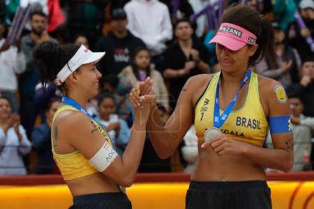 Photo for October 15, 2023, Tlaxcala, Mexico: Silver medalist Eduarda 'Duda' Lisboa and Ana Patrcia Ramos of Brazil celebrate with their medals during the medal ceremony  for theWomen's Beach Volleyball World Championship Final - Royalty Free Image