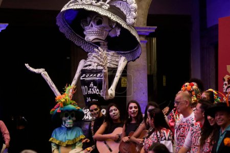Photo for October 16, 2023, Mexico City, Mexico: People characterized as death, catrinas and catrines during the announcement of the Day of the Dead activities at the press conference at the Mexico City Museum in Mexico City - Royalty Free Image