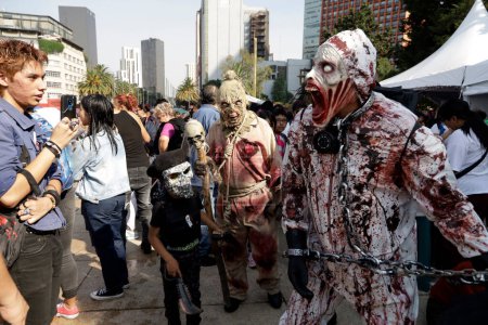Photo for October 21, 2023, Mexico City, Mexico: Hundreds of people dressed as zombies participate in the zombie march in Mexico City - Royalty Free Image