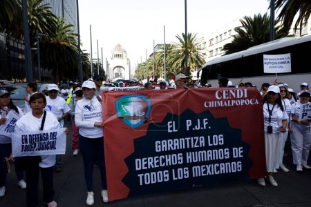 Photo for October 22, 2023, Mexico City, Mexico: Thousands of workers from the Judicial Branch of the Federation of Mexico march to demand that the Government of Mexico not disappear their trusts. Mobilization of workers in Mexico City - Royalty Free Image