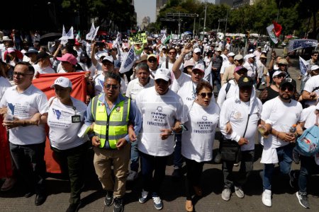 Photo for October 22, 2023, Mexico City, Mexico: Thousands of workers from the Judicial Branch of the Federation of Mexico march to demand that the Government of Mexico not disappear their trusts. Mobilization of workers in Mexico City - Royalty Free Image
