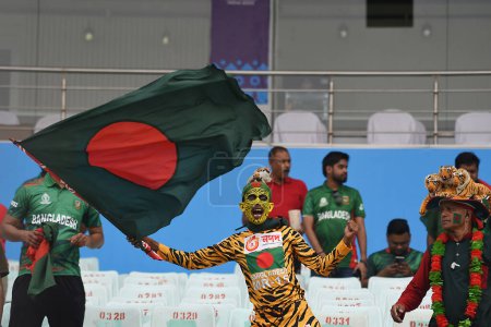 Photo for October 28, 2023, Kolkata, India :Bangladesh fans support their team during match between Netherlands and Bangladesh of  the 2023 ICC Men's Cricket World Cup  at the Eden Gardens Stadium - Royalty Free Image
