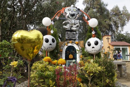 Photo for November 2, 2023, Mexico City, Mexico: The graves of children and adults are decorated with arrangements and gifts on the Day of the Dead holiday at the Pantheon of San Antonio Tecomitl in the Milpa Alta Mayor's Office in Mexico City - Royalty Free Image