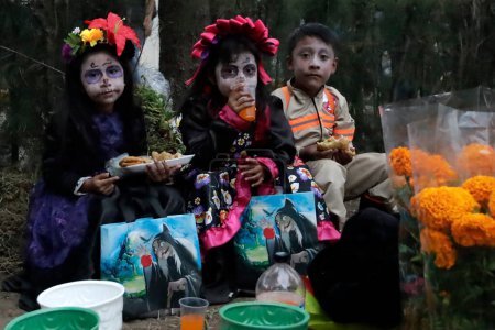 Photo for November 2, 2023, Mexico City, Mexico: Children characterized by death - Catrinas and Catrin on the Day of the Dead at the Pantheon of San Antonio Tecomitl in the Milpa Alta Mayor's Office in Mexico City - Royalty Free Image