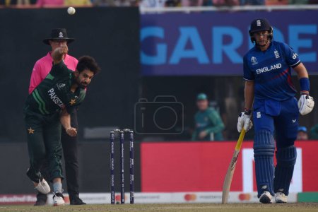 Photo for November 11, Kolkata, India: Haris Rauf of Pakistan  in bowling action during the 2023 ICC Men's Cricket World Cup match between England and Pakistan at the Eden Gardens Stadium - Royalty Free Image