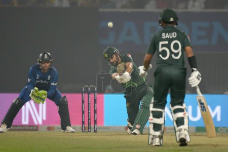 Photo for November 11, Kolkata, India: Haris Rauf of Pakistan  plays a shot  during the 2023 ICC Men's Cricket World Cup match between England and Pakistan at the Eden Gardens Stadium - Royalty Free Image