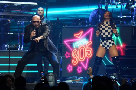 Photo for November 17, 2023, Dallas, Texas, United States: American rapper Armando Christian Prez,  known as Pitbull, performs on stage as part of the The Trilogy Tour at the American Airlines Cente - Royalty Free Image