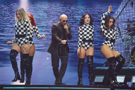 Photo for November 17, 2023, Dallas, Texas, United States: American rapper Armando Christian Prez,  known as Pitbull, performs on stage as part of the The Trilogy Tour at the American Airlines Center - Royalty Free Image