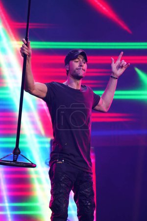 Photo for Dallas, Texas, USA: Spanish singer and songwriter Enrique Iglesias performs at the American Airlines Center as part of the Trilogy Tour (Ricky Martin, Enrique Iglesias and Pitbull) - Royalty Free Image