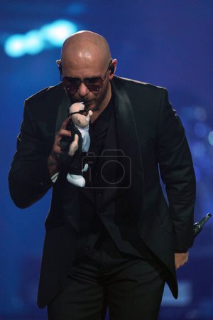 Photo for November 17, 2023, Dallas, Texas, United States: American rapper Armando Christian Prez,  known as Pitbull, performs on stage as part of the The Trilogy Tour at the American Airlines Center - Royalty Free Image