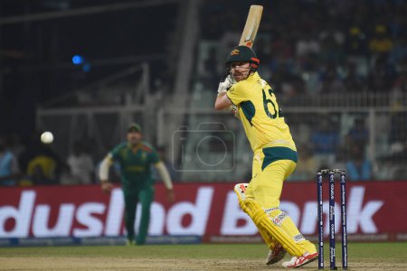Photo for October 16, 2023, Kolkata ,India: Travis Head of Australia plays a shot against South Africa during the semifinal match between Australia and South Africa of the ICC Men's Cricket World Cup at Eden Gardens Stadium - Royalty Free Image