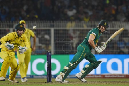 Photo for October 16, 2023, Kolkata ,India: David Miller  of South Africa hits a boundary against Australia during the semifinal match between Australia and South Africa of the ICC Men's Cricket World Cup at Eden Gardens Stadium - Royalty Free Image