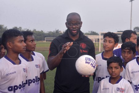 Photo for November 21,2023, Kolkata, India: Former French soccer player, Louis Laurent Saha, attends the Sports clinic for children and youth  as part of  the launch of Fourth edition of the United We Play program - Royalty Free Image