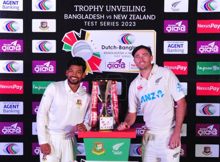 Photo for 27 November 2023 Sylhet-Bangladesh: Najmul Hossain Shanto (Bangladesh Captain) and Tim Southee (New Zealand Captain) unveiled the Dutch-Bangla Bank Test Series 2023 trophy in Sylhet - Royalty Free Image