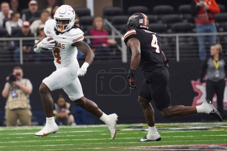Photo for December 2, 2023, Arlington, Texas, United States: running back CJ Baxter in action during the 2023 Dr Pepper Big 12 Championship game between Texas Longhorns  and Oklahoma State Cowboys - Royalty Free Image